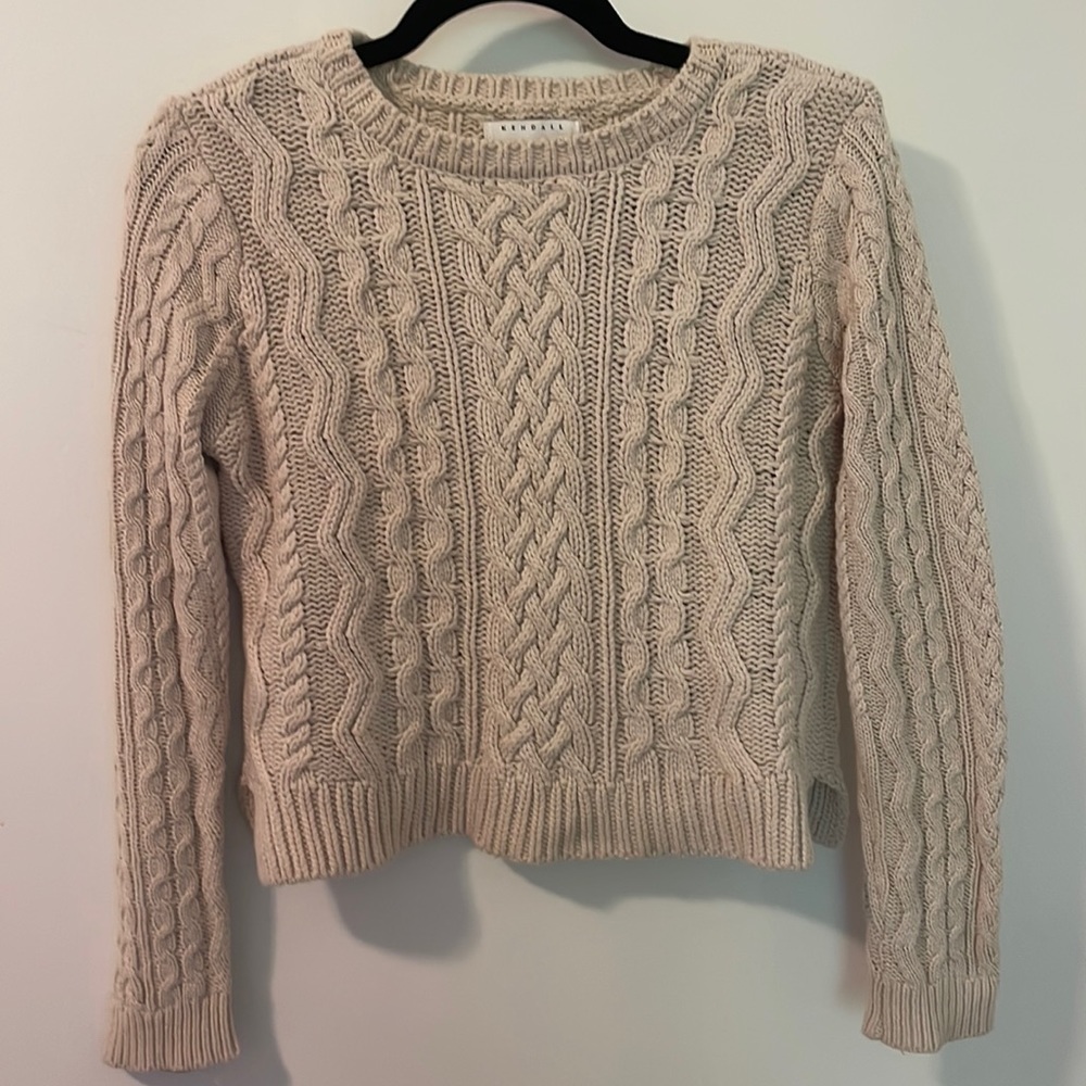 Cropped cable knit sweater